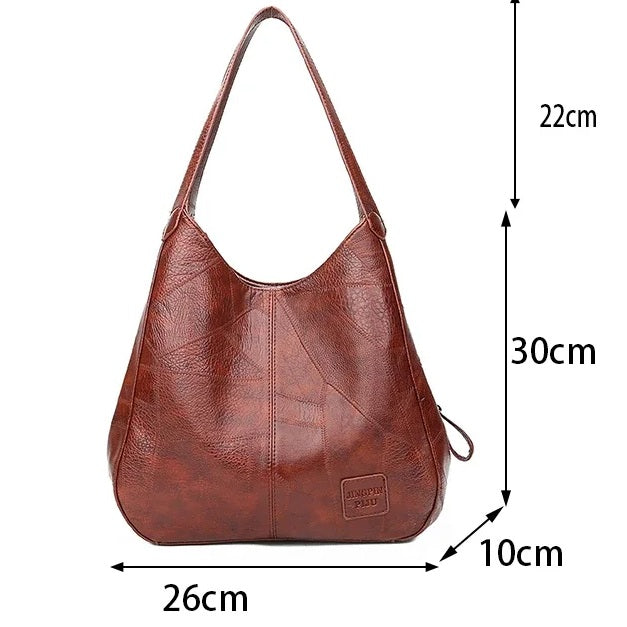 Red leather hobo bag