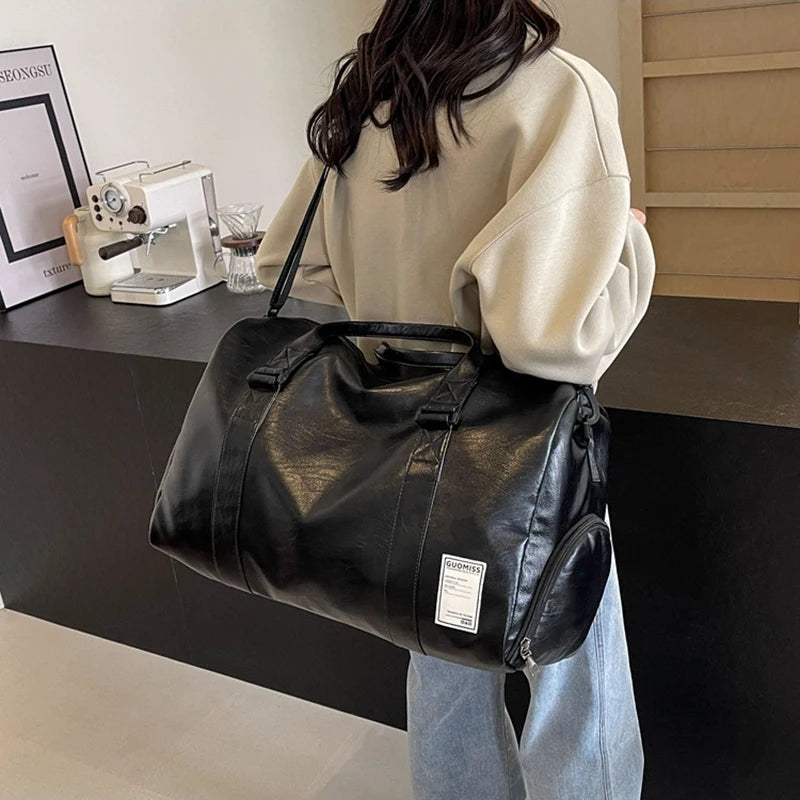 Slim leather duffle bag