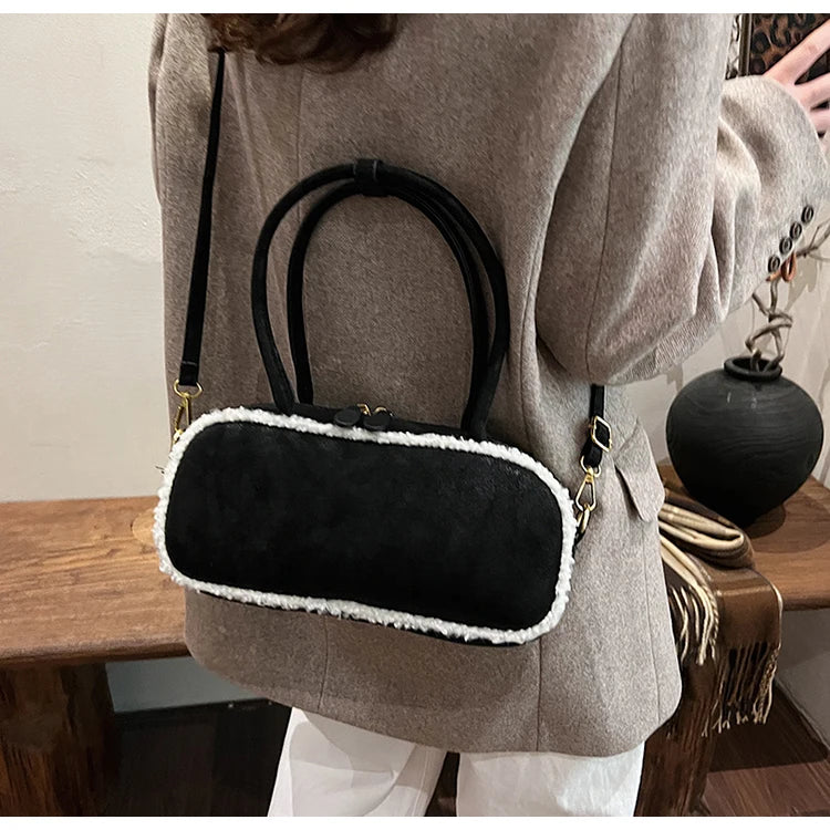 Elegant suede handbag with vintage charm