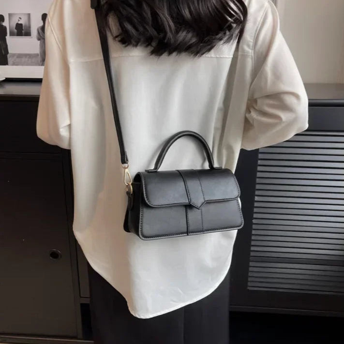 Compact leather sling bag for daily essentials