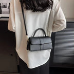 Compact leather sling bag for daily essentials
