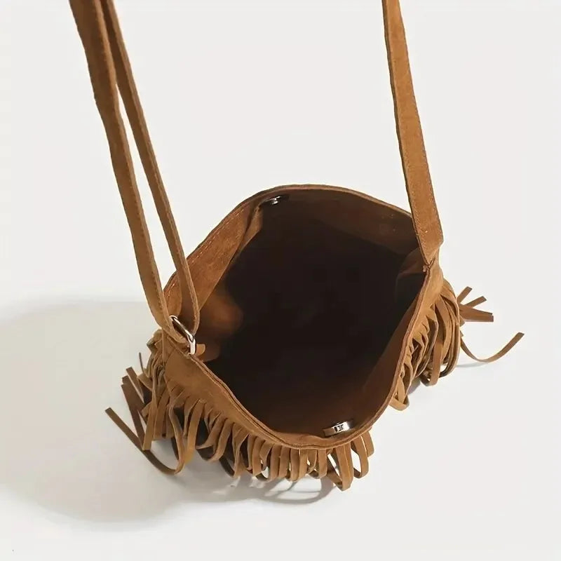 Classic suede shoulder bag with soft silhouette