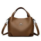 Leather handbag with wide base