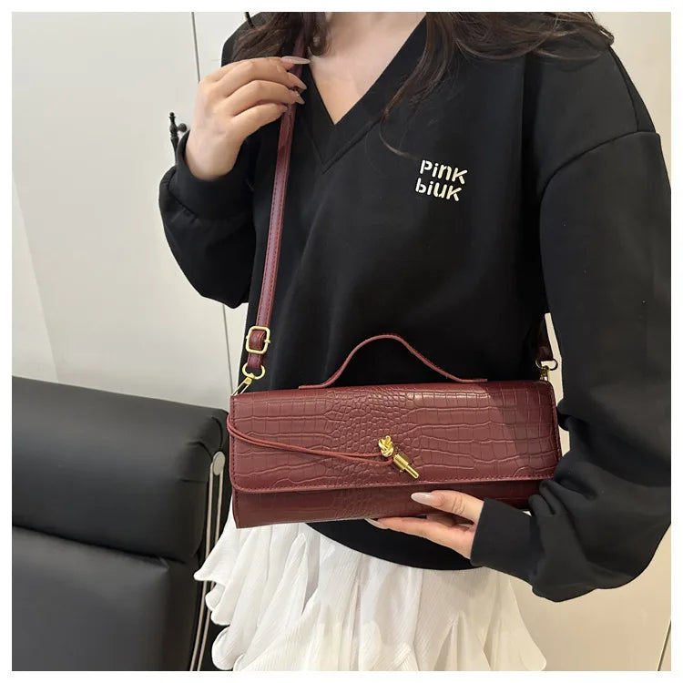 Compact leather handbag