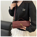 Compact leather handbag
