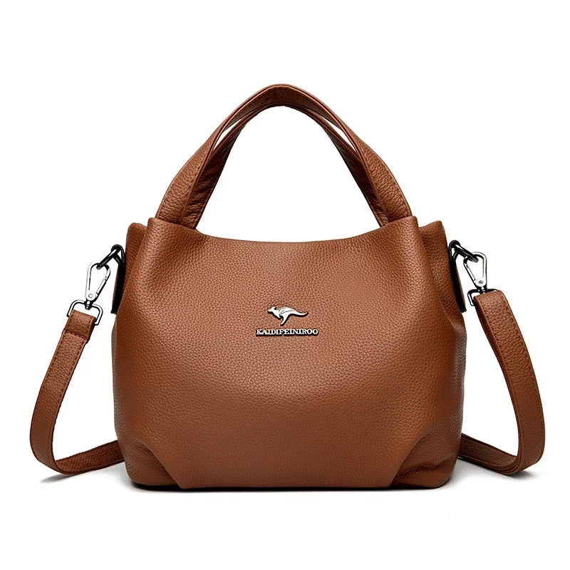 Leather handbag with wide base