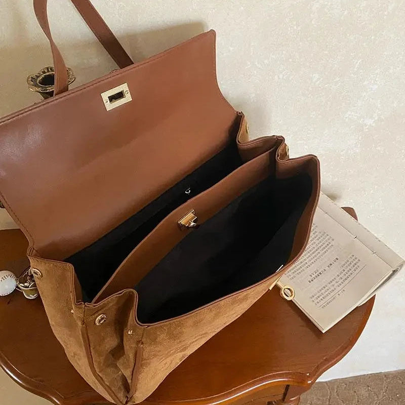 Structured modern suede handbag
