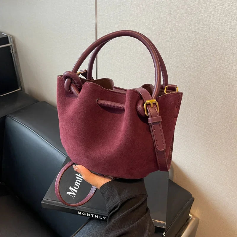 Everyday suede handbag with strap