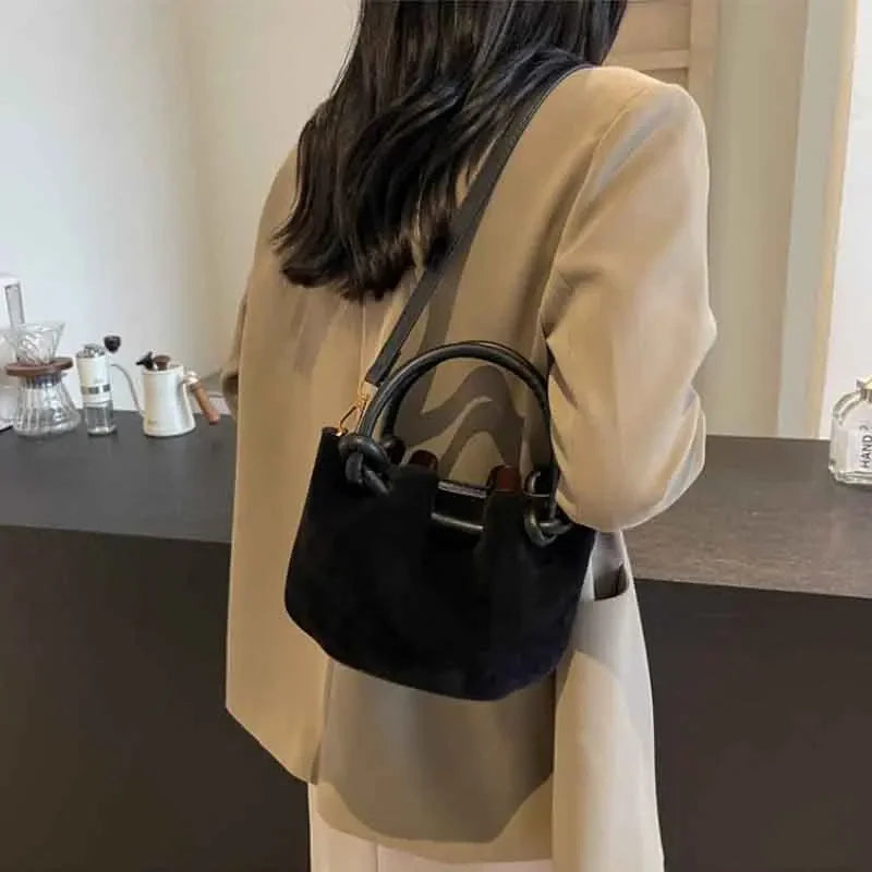 Everyday suede handbag with strap
