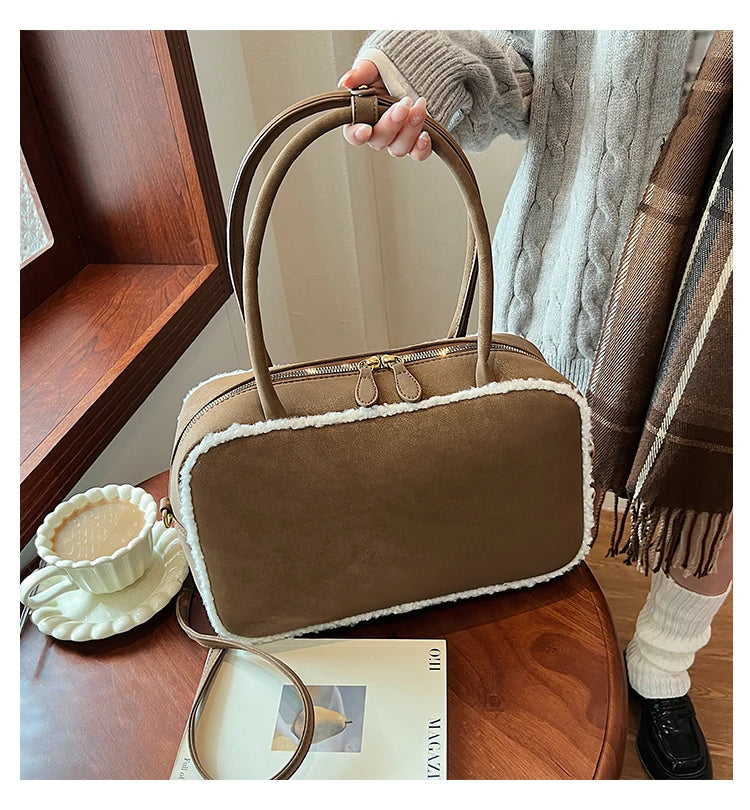 Elegant suede handbag with vintage charm