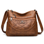 Leather shoulder bag with adjustable strap