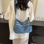 Classic denim shoulder handbag with zipper closure