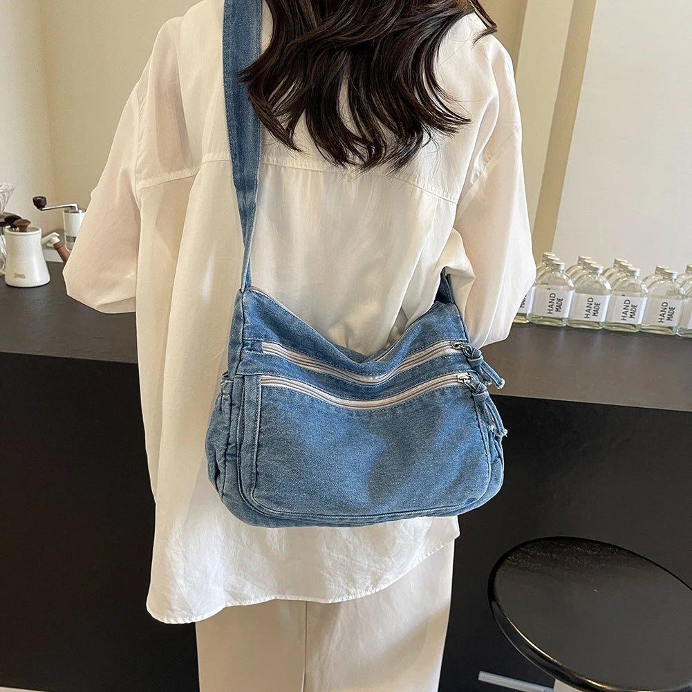 Classic denim shoulder handbag with zipper closure