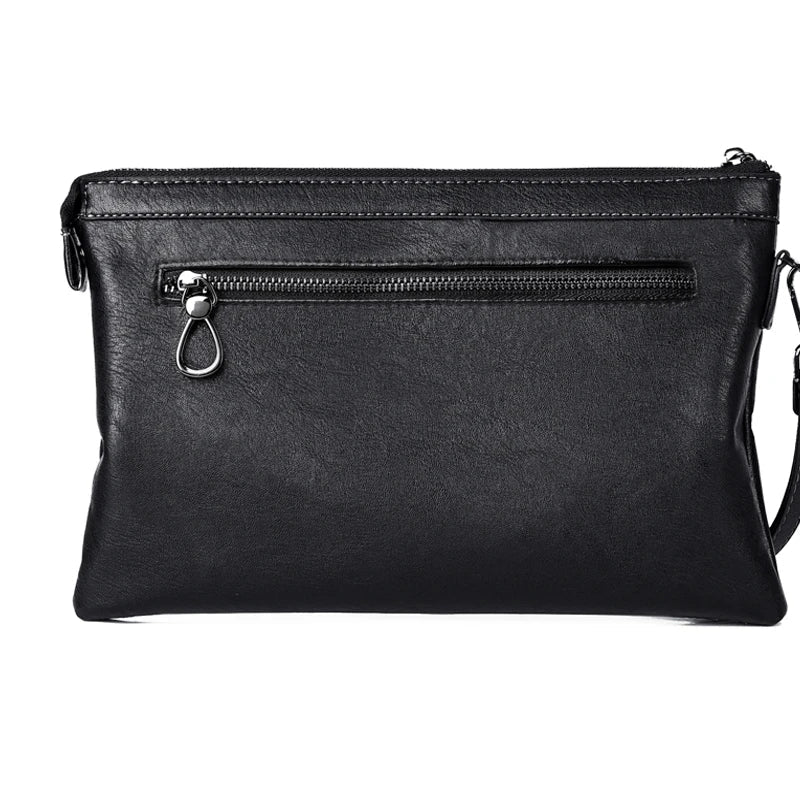 Minimalist leather clutch with detachable strap