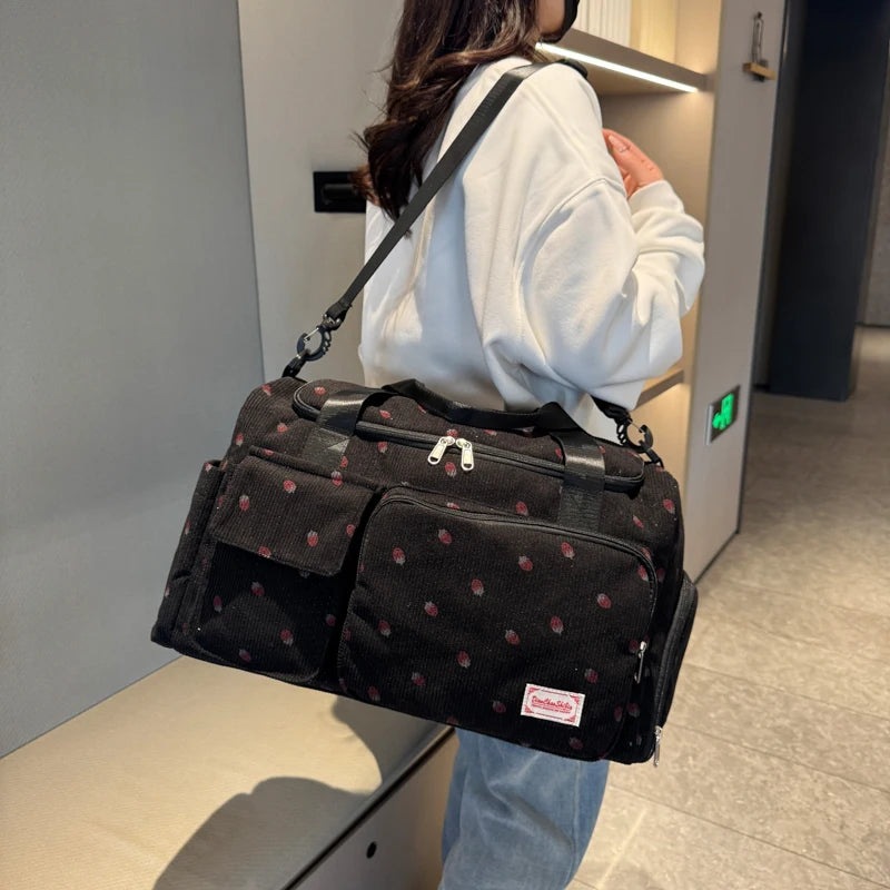 Corduroy travel toiletry bag with shoulder strap