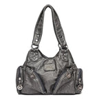 Leather shoulder bag with side pockets