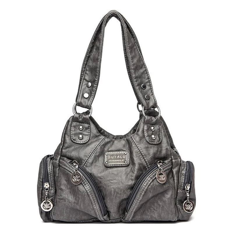 Leather shoulder bag with side pockets