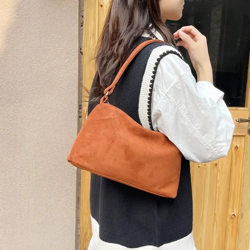 Structured suede shoulder bag