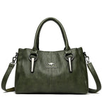 Leather handbag with detachable shoulder strap