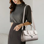Designer-inspired leather handbag