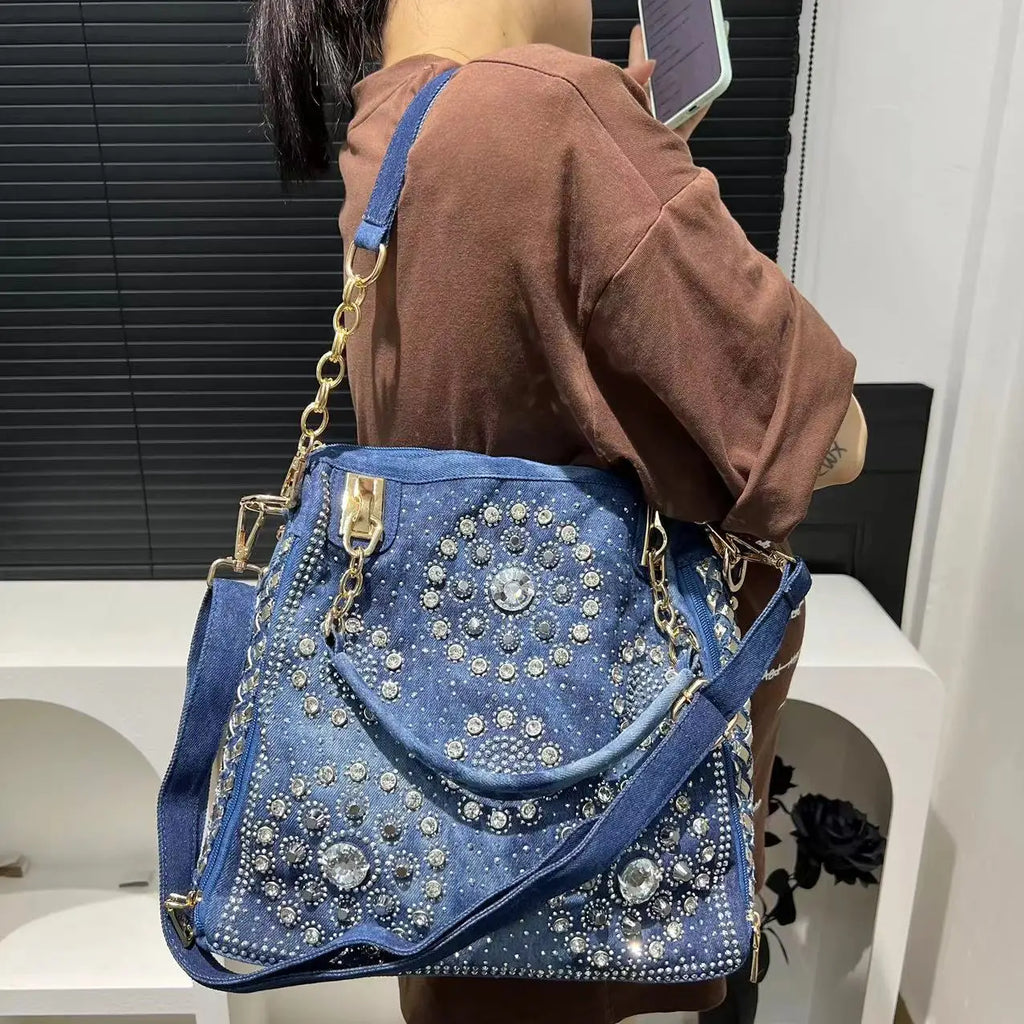 Elegant floral embroidered denim handbag with chain handle