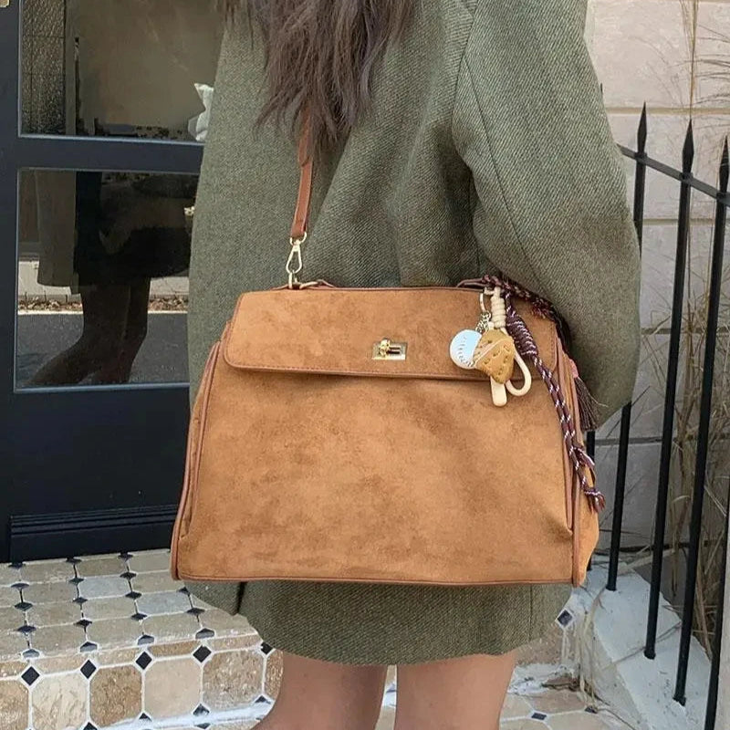 Structured modern suede handbag