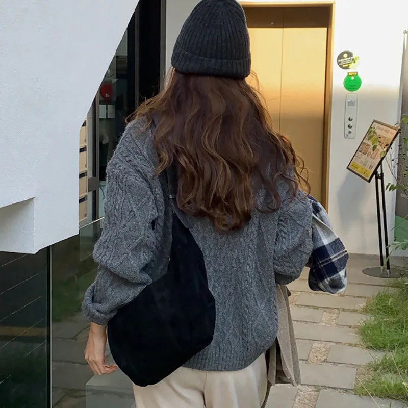 Soft suede slouch bag with single shoulder carry