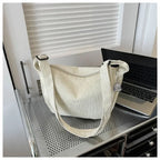Corduroy handbag with adjustable shoulder strap