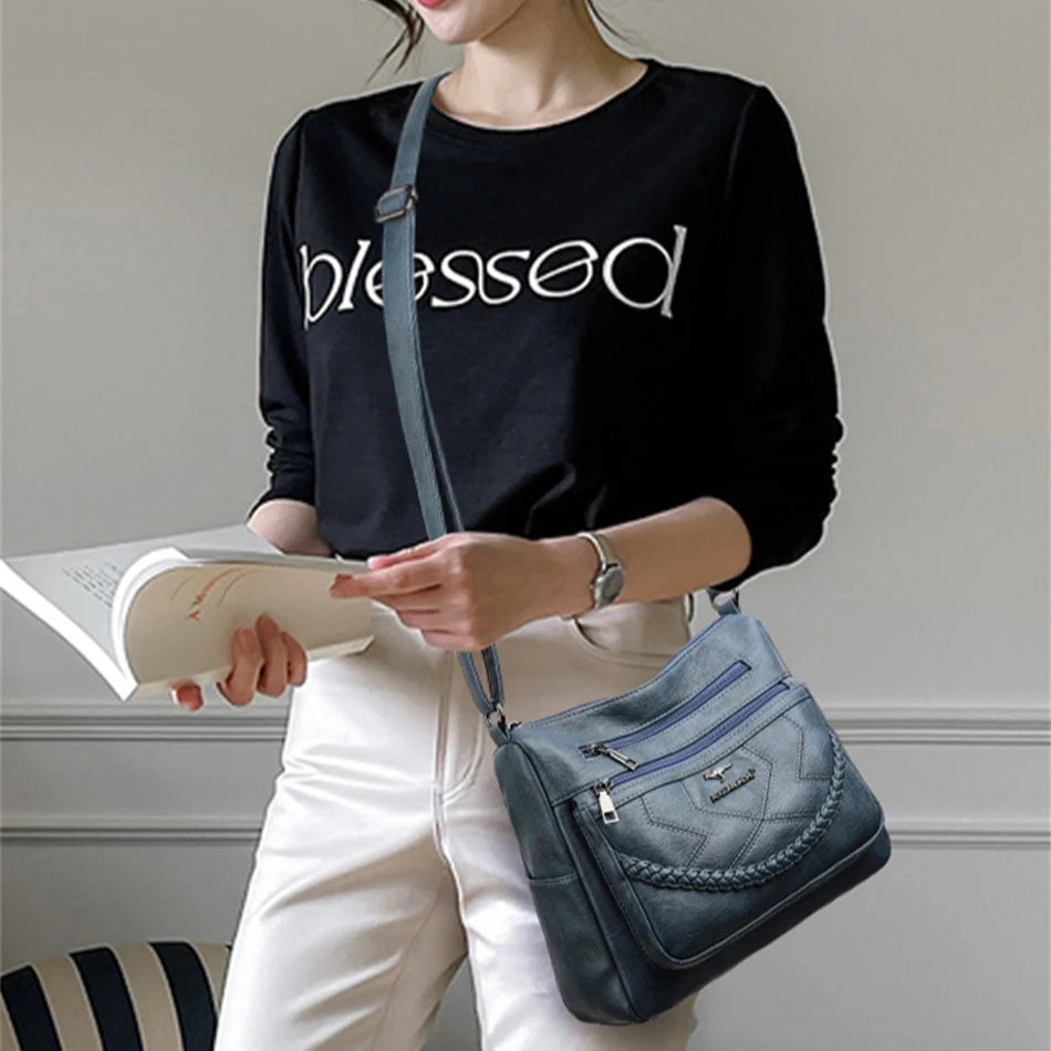 Leather shoulder bag with adjustable strap