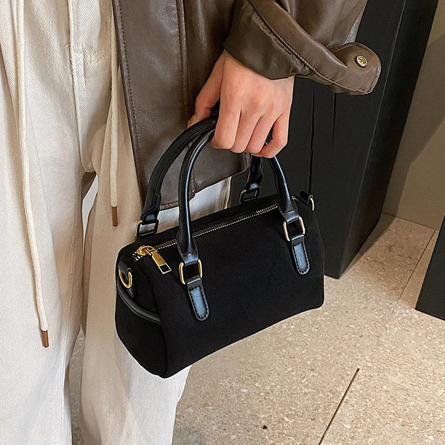 High-end suede purse with structured body