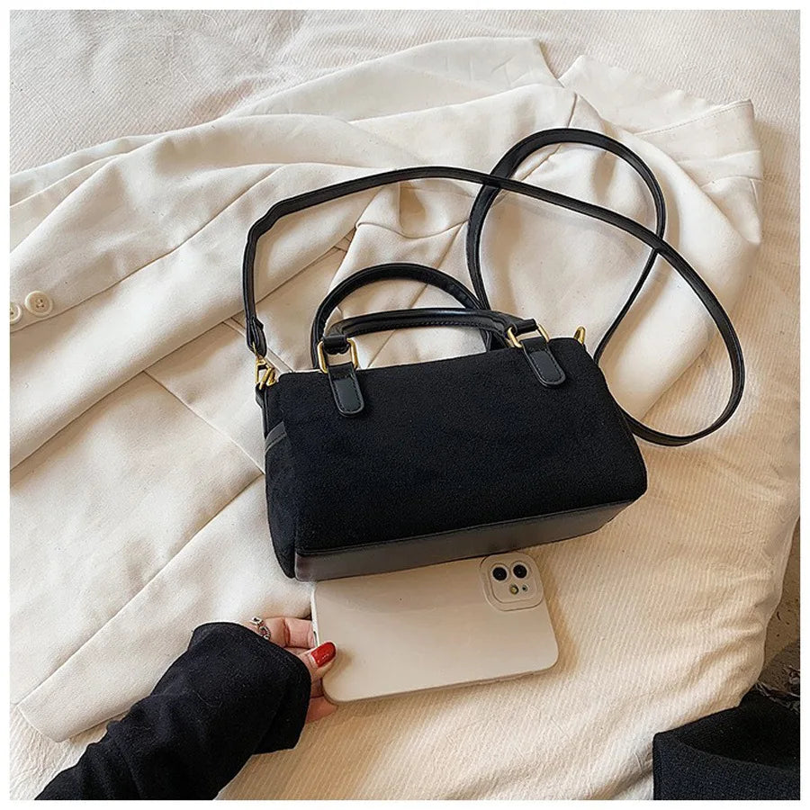 High-end suede purse with structured body