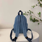 Embroidered women's denim backpack