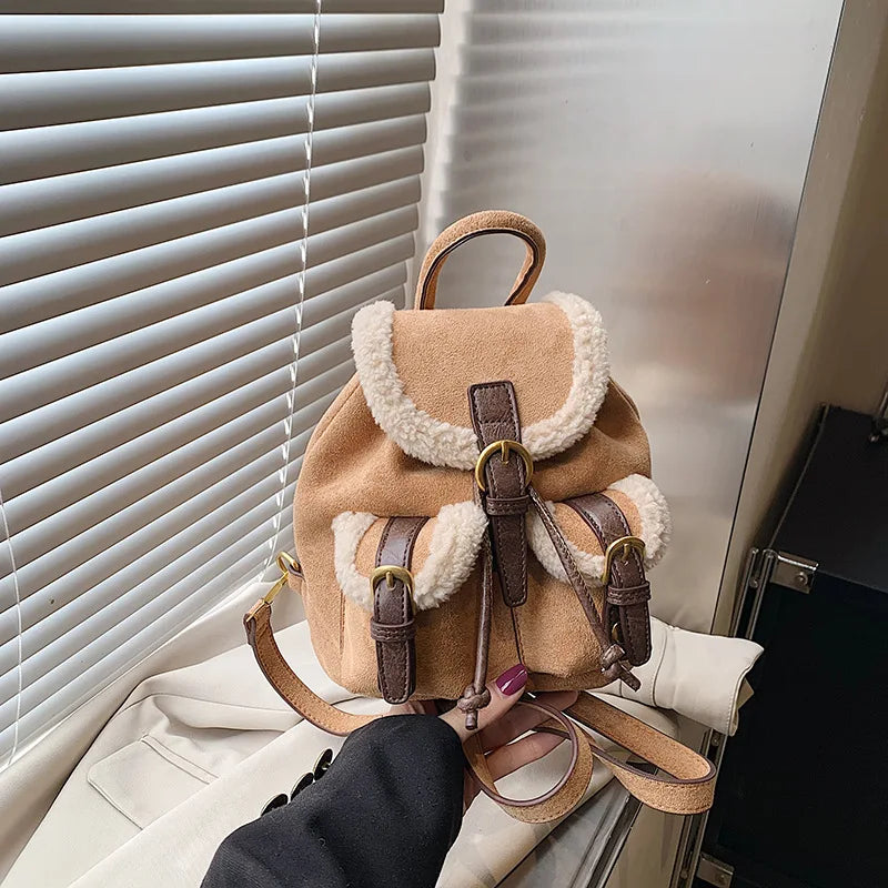 Suede backpack with front pockets