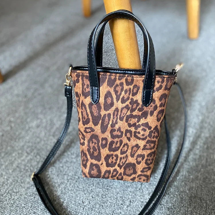Two-tone suede purse with leather accents