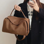Suede handbag with subtle colors