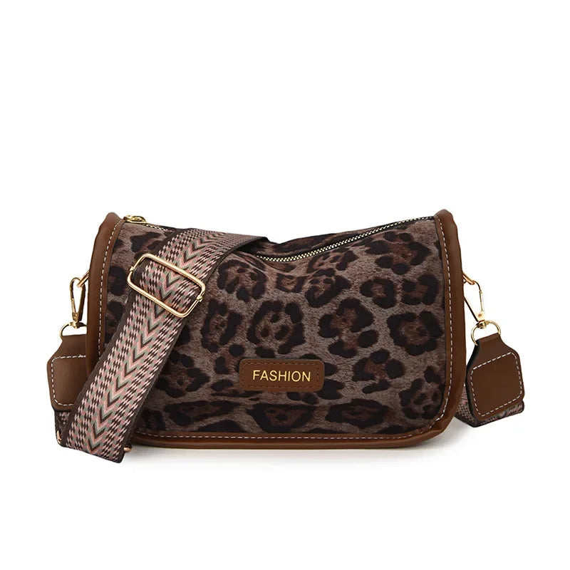 Sleek suede purse with wide shoulder strap