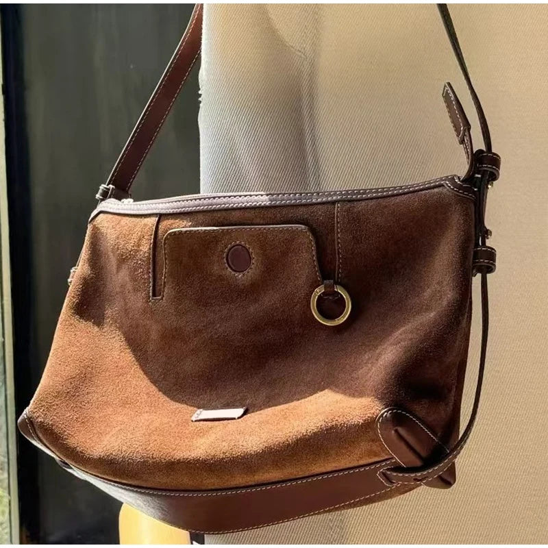 Sleek suede handbag for travel and errands