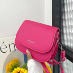 Compact leather sling crossbody