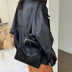 Suede handbag with subtle colors