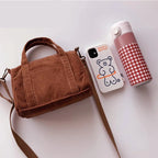 Corduroy purse with detachable shoulder strap