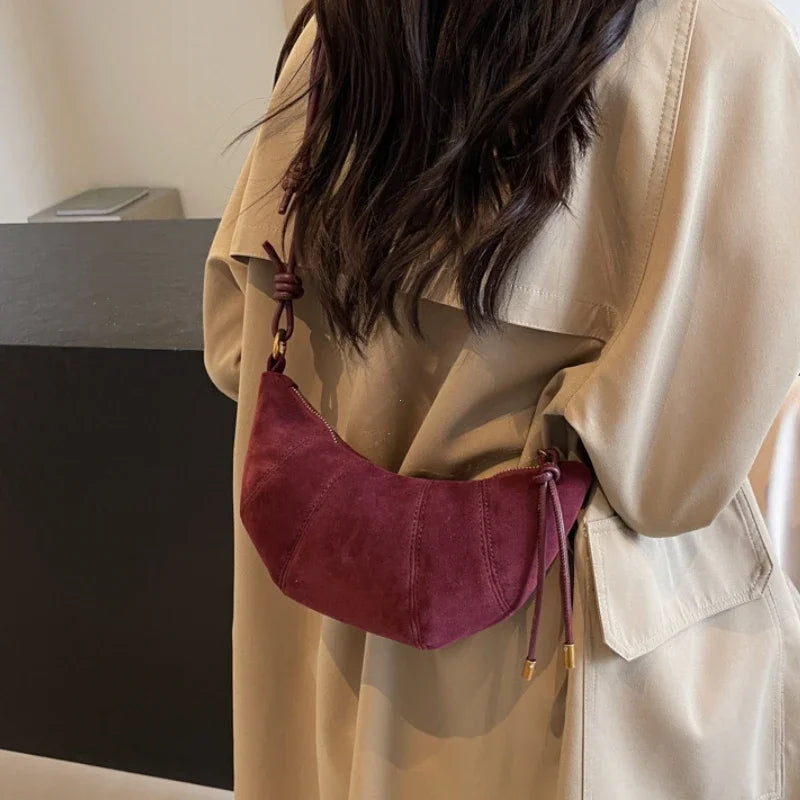 Crescent suede hobo bag