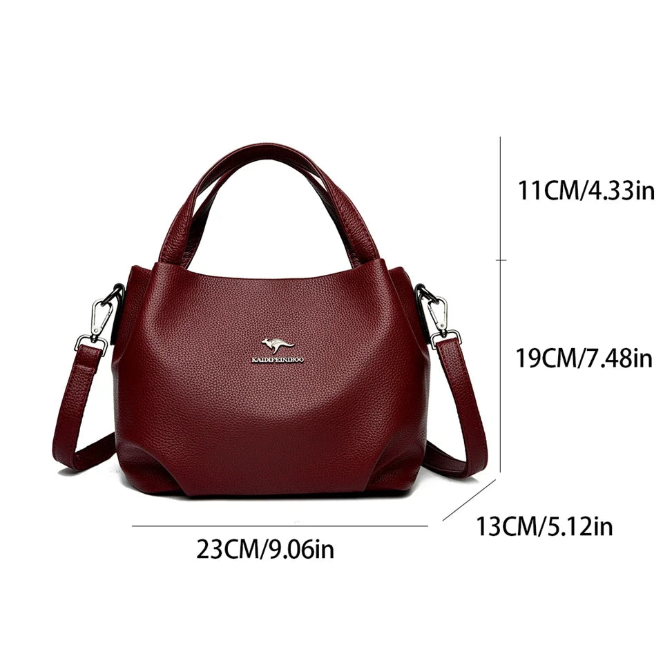 Leather handbag with wide base
