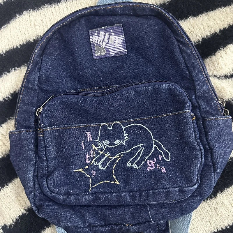 Cat-embroidered denim backpack