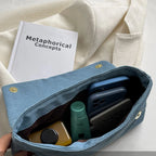 Flap-style denim shoulder handbag