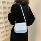Compact leather sling crossbody
