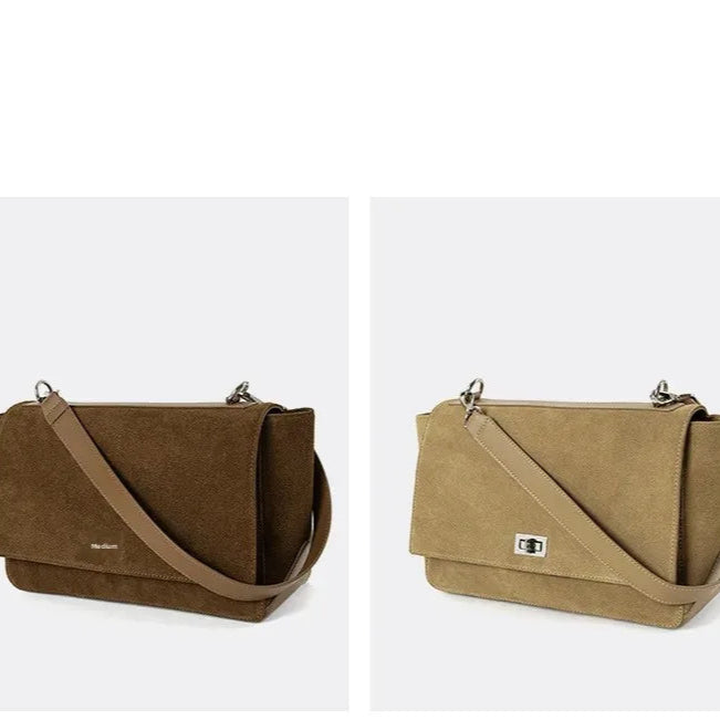 Textured suede handbag with flap closure