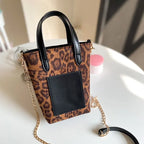 Two-tone suede purse with leather accents
