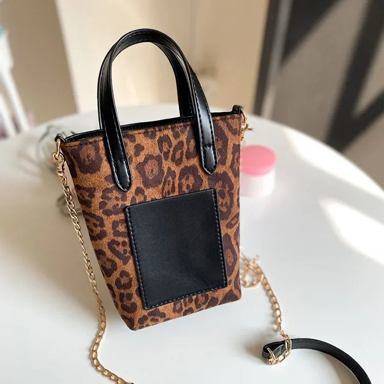 Two-tone suede purse with leather accents