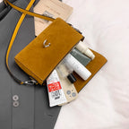 Structured suede handbag with minimalist shape