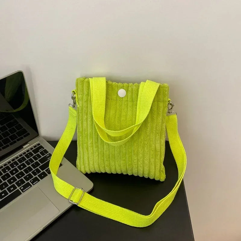 Amblot Apple green Corduroy handbag with front button detail